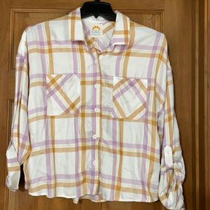 Long sleeve button up blouse.